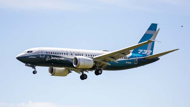 A Boeing 737 MAX jet comes in for a landing following a Federal Aviation Administration (FAA) test flight at Boeing Field in Seattle, Washington on June 29, 2020.