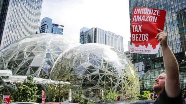 A caravan of protesters in cars surrounds the Amazon Spheres in Seattle, May 1