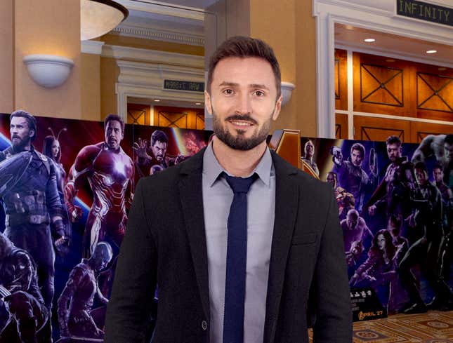Image for article titled Super Fan Attends Screening Of ‘Infinity War’ Dressed As Marvel’s VP Of Marketing