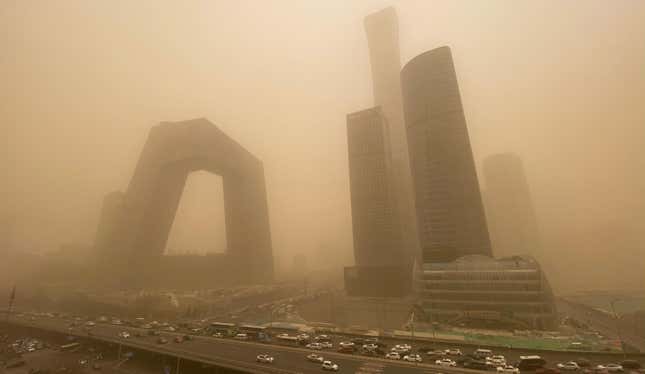 Buildings are seen in the central business district of Beijing during a sandstorm on March 15, 2021. 
