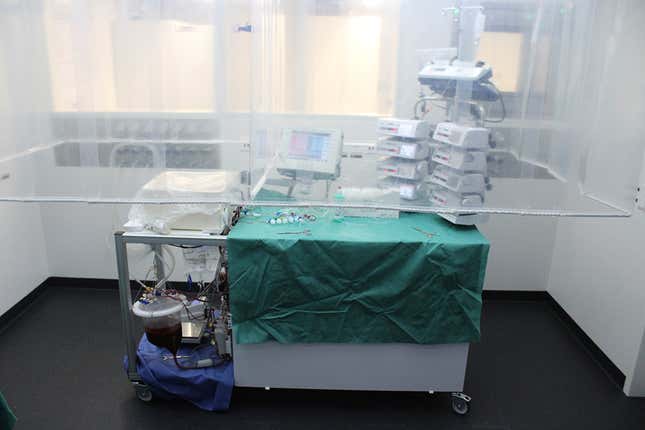 The perfusion machine while in operation, with the liver in the white container at left.