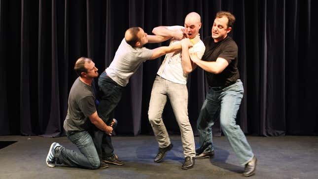 Rapidly balding members of the improv troupe Calhoun.