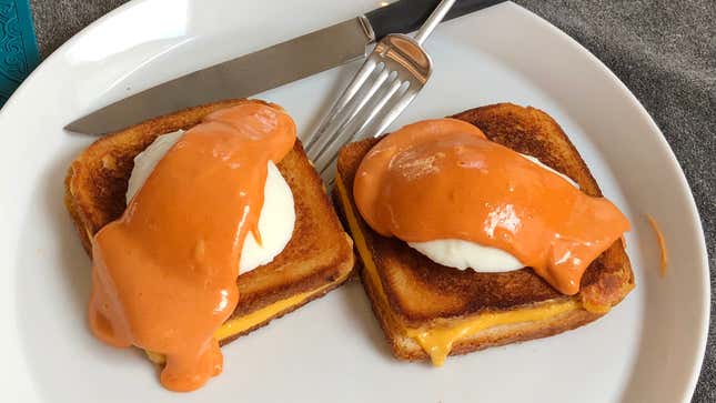 Eggs Benedict grilled cheese on plate