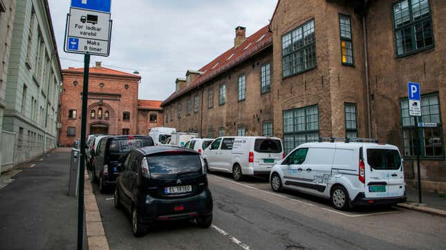 Electric cars are being charged on a street in the Norwegian capital Oslo on April 30, 2019.