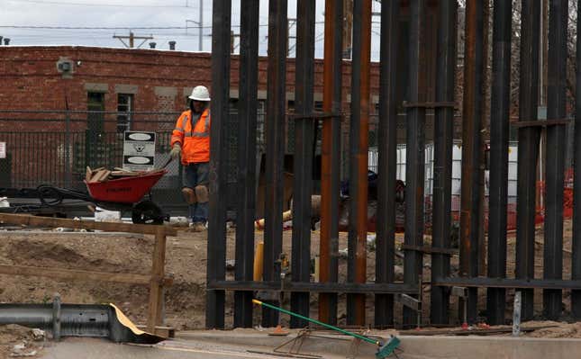 US workers build the border wall between El Paso, Texas, US and Ciudad Juarez, Mexico on February 5, 2019. 