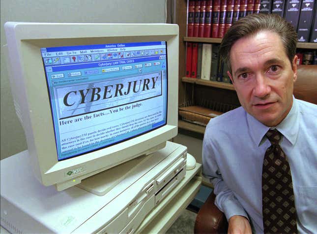 Personal-injury lawyer Roy J. Konray shows off his Cyberjury site on his computer at his law office in Rahway, N.J., on Friday, Aug. 9, 1996.