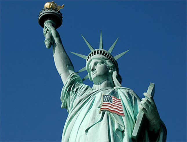Image for article titled 40-Foot American Flag Pin Welded To Statue Of Liberty
