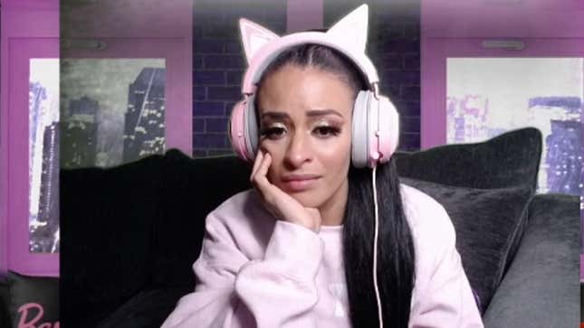 An emotional Thea Trinidad Budgen greets her Twitch subscribers hours after being fired from her WWE role playing the Zelina Vega character.