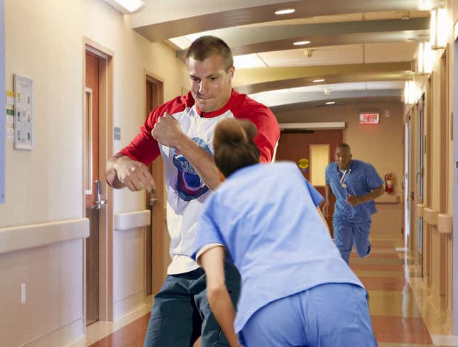 Image for article titled Gronkowski Breaks 6 Tackles On Way Out Of Neurology Clinic To Finalize Trade With Tampa Bay
