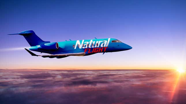 A Natural Light branded jet flying in the sky
