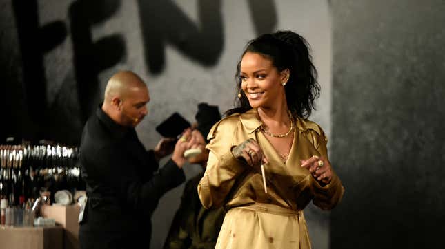 Image for article titled Rihanna Knows Every Commenter Is Just Three Babies in a Trench Coat