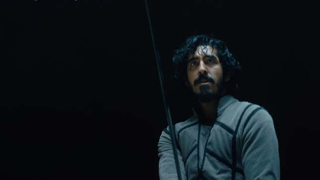 Image for article titled Dev Patel gets medieval on your ass in The Green Knight trailer