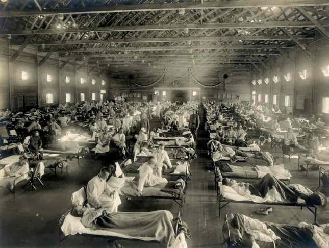 Flu patients at a temporary hospital in Kansas, 1918.