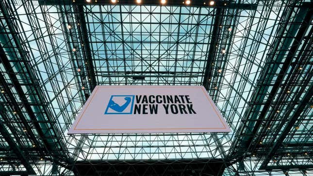 A banner hangs from the ceiling at the Jacob K. Javits Convention Center on January 13, 2021 during a media tour of the new state vaccination site in New York City. 