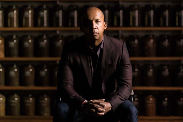 Bryan Stevenson in front of social collection jars, Equal Justice Initiative, 2018