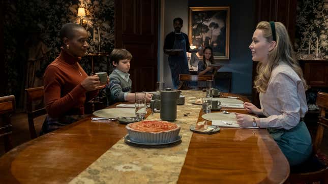 Hannah, Miles, Owen, and Flora welcome Dani to dinner.