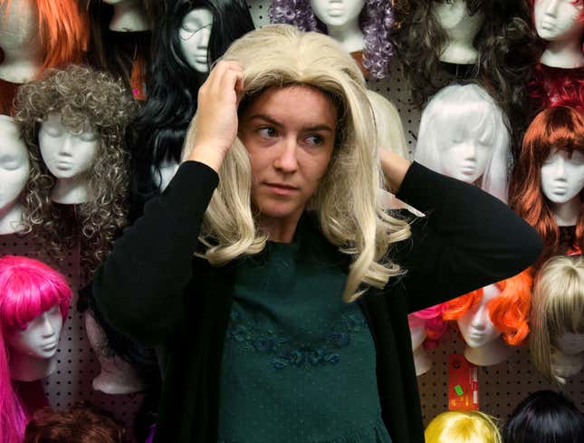 Image for article titled Lice Having Blast Trying Out Different Wigs At Costume Shop