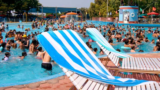 Image for article titled Towels Across Water Park Lounge Chairs Mark Family’s Ironclad Claim