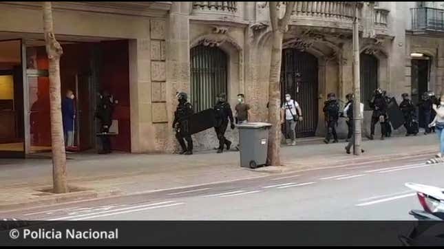 Spanish police participate in raids related to the alleged pirate ring.