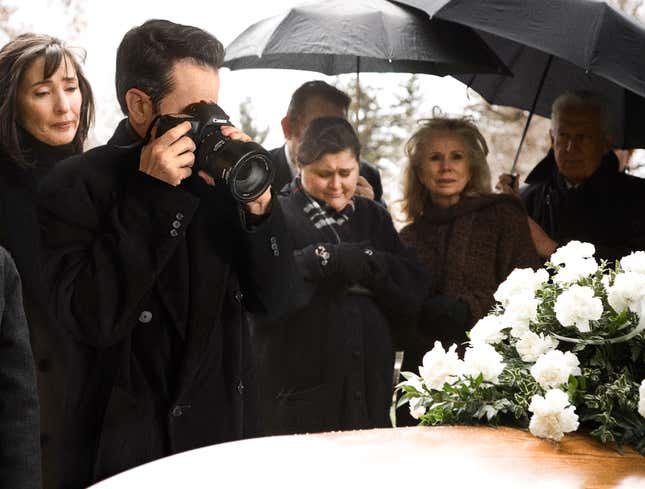 Image for article titled Dad Figures Funeral Just As Good A Time As Any To Try Out New Camera Lens