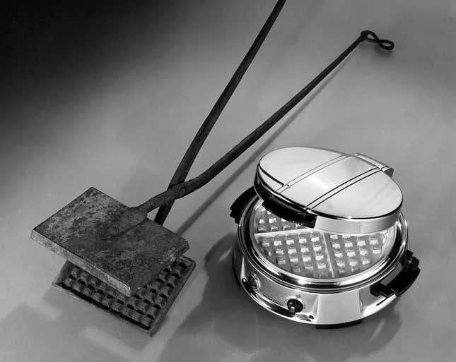 Waffle irons ancient (left) and modern (right)