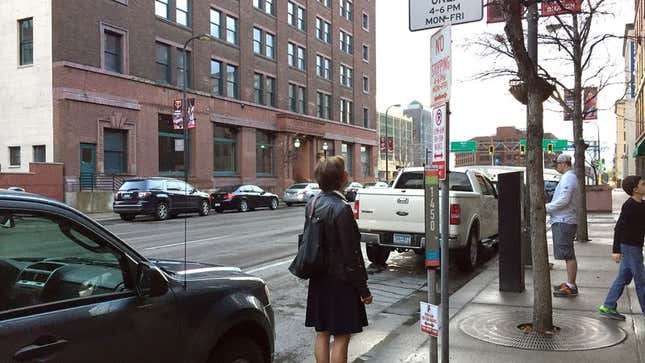 Image for article titled Mom Sent On Fact-Finding Mission To Read What Parking Sign Down Street Says