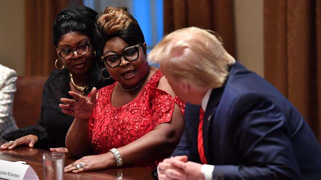 Lynnette “Diamond” Hardaway and Rochelle “Silk” Richardson with Donald Trump at the White House in February 2020.