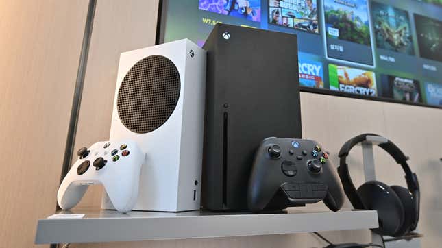 Microsoft’s Xbox Series X (black) and series S (white) gaming consoles are displayed at a flagship store of SK Telecom in Seoul on November 10, 2020.