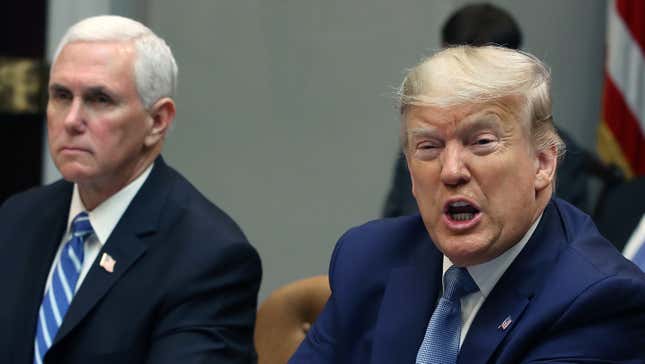 President Donald Trump speaks about the coronavirus response next to Vice President Mike Pence during a coronavirus briefing with health insurers in the Roosevelt Room at the White House, on March 10, 2020.