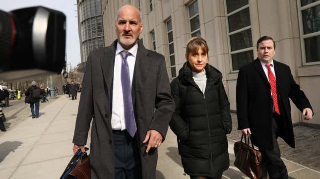 Actress Allison Mack leaves the Brooklyn Federal Courthouse with her lawyers after a court appearance surrounding the alleged sex cult NXIVM on February 06, 2019 in New York City.