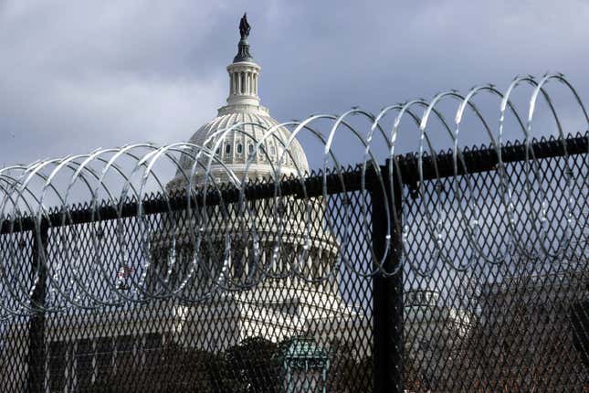 Image for article titled Video Shows Suspect Likely Placed Pipe Bombs Near Capitol Ahead of Jan. 6; Police Chief Calls for Permanent Fencing Around Capitol