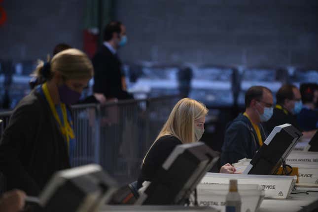 Election officials proceed with the counting of ballots at the Allegheny County elections warehouse on November 6, 2020 in Pittsburgh, Pennsylvania. 