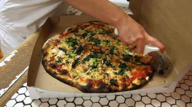  A takeout pizza at Frank Pepe Pizzeria, the birthplace of New Haven-style pizza
