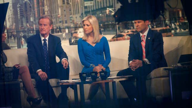 Fox &amp; Friends hosts Steve Doocy, Ainsley Earhardt, and Brian Kilmeade broadcast from the studio in 2017.