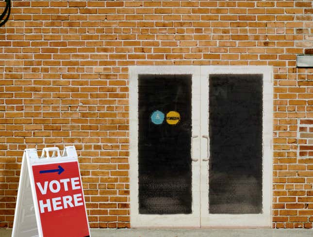 Image for article titled Polling Place In Predominantly Black Neighborhood Clearly Brick Wall With Door Painted On