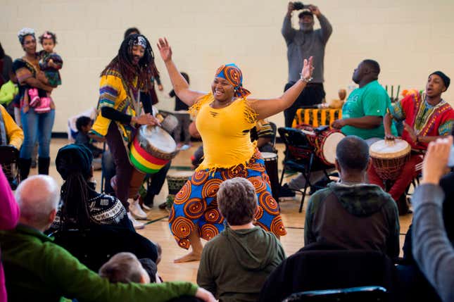 Performers with the African Heritage Dancers and Drummers hold a Kwanzaa celebration hosted by the Smithsonian Anacostia Community Museum at Fort Stanton Recreation Center in Washington, D.C., Dec. 27, 2017.