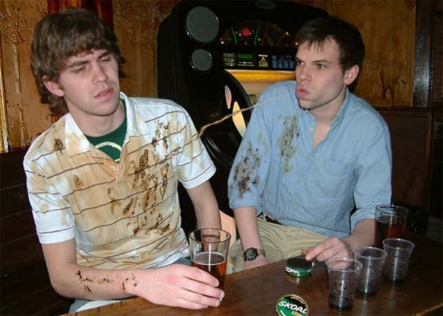 A non-chewing bargoer sits next to a tobacco chewer in Wilmington, DE.