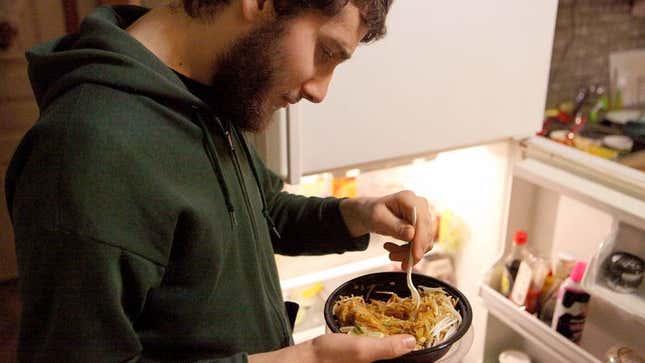 Image for article titled Man Figures He Has 2 More Bites Of Roommate’s Leftovers Before It Noticeable