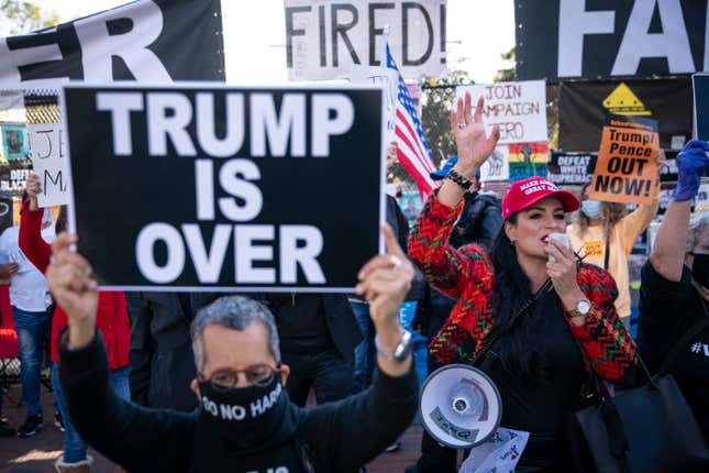 Supporters of U.S. President Donald Trump and counter protesters demonstrate outside of the White House ahead of Saturday’s Million MAGA March on November 13, 2020 in Washington, DC. Supporters clashed with protesters organized by Shutdown DC at Black Lives Matter Plaza.