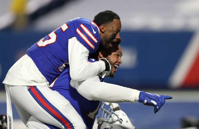 Taiwan Jones and Dion Dawkins celebrate the Bills’ first AFC Championship appearance since 1993.