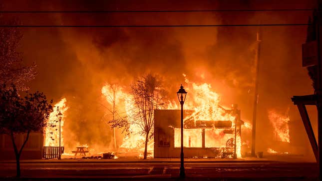Buildings are engulfed in flames as a wildfire ravages the central Oregon town of Talent near Medford.