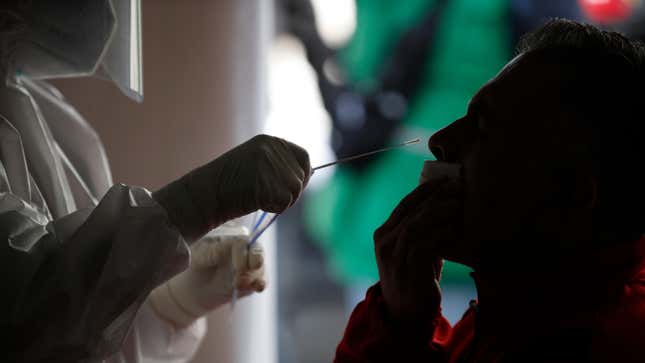 A patient in Mexico City, Mexico receiving a covid-19 nasal swab test in December 2020.