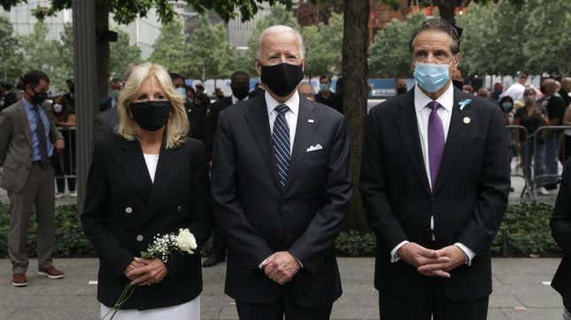 Joe Biden (center), Dr. Jill Biden (left) and New York Gov. Andrew Cuomo (right) attend a 9/11 memorial service at the National September 11 Memorial and Museum on September 11, 2020 in New York City. 