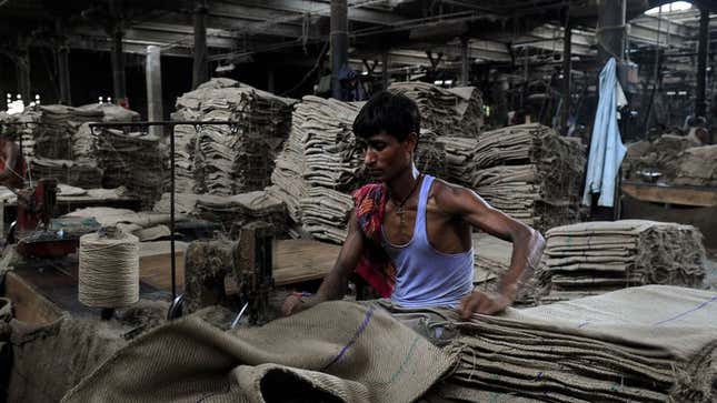 Image for article titled Indian Sweatshop Worker Has To Work In The Fucking Dark Now Too