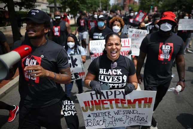 Members of the Washington Wizards and Washington Mystics basketball teams march to the MLK Memorial to support Black Lives Matter and mark the Juneteenth holiday June 19, 2020 in Washington, D.C. 