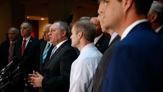 House Minority Whip Steve Scalise, R-La., fourth from left, speaks to members of the media in front of House Republicans after Deputy Assistant Secretary of Defense Laura Cooper arrived for a closed door meeting to testify as part of the House impeachment inquiry into President Donald Trump, Wednesday, Oct. 23, 2019, on Capitol Hill in Washington.