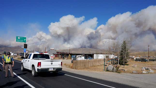 Smoke rises from a wildfire in Colorado on Thursday.