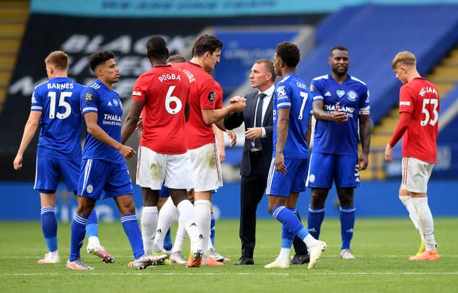 Brendan Rodgers, manager of Leicester City and Harry Maguire of Manchester United shake hands after the Premier League match between Leicester City and Manchester United.