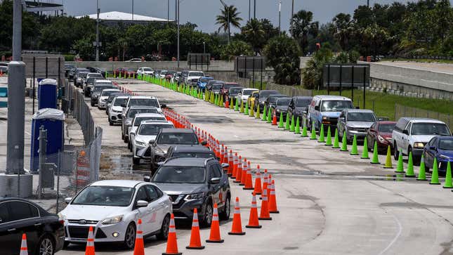 Cars line up for coronavirus testing site at Hard Rock Stadium in Miami Gardens near Miami, on August 5, 2020.