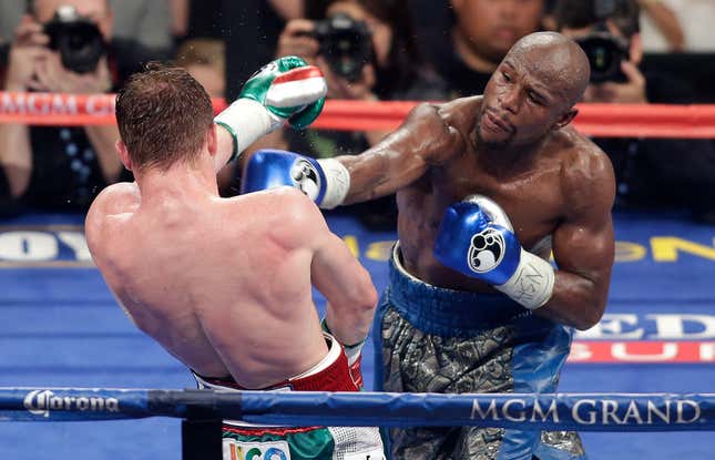 Floyd Mayweather Jr. vs. “Canelo” Álvarez. Photo by Isaac Brekken/AP